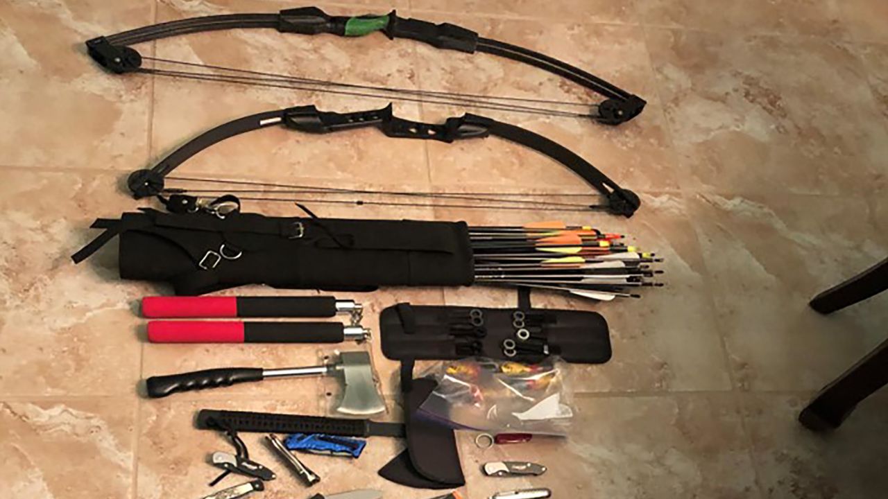 Authorities say they found numerous knives and other weapons, some of which are shown in this photo.
