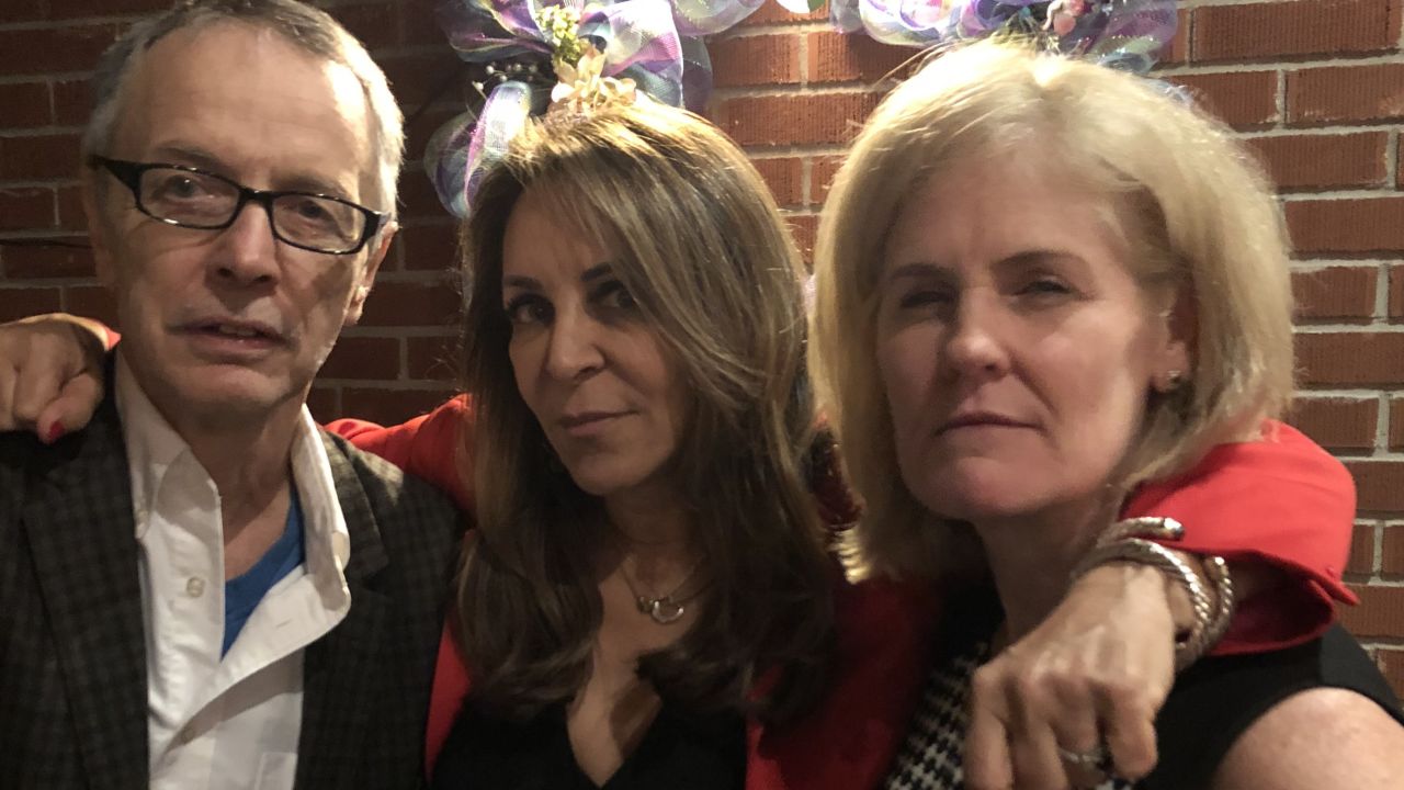 Klapper, center, is pictured with Romedio Viola (left) and analyst Sharon Garvey (right). The El Dorado team still keeps in touch.