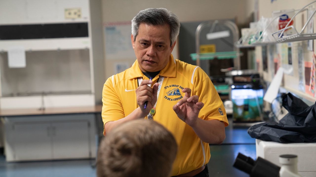 Noel Que left his family in the Philippines to teach in Arizona. He sends half of his salary back home.