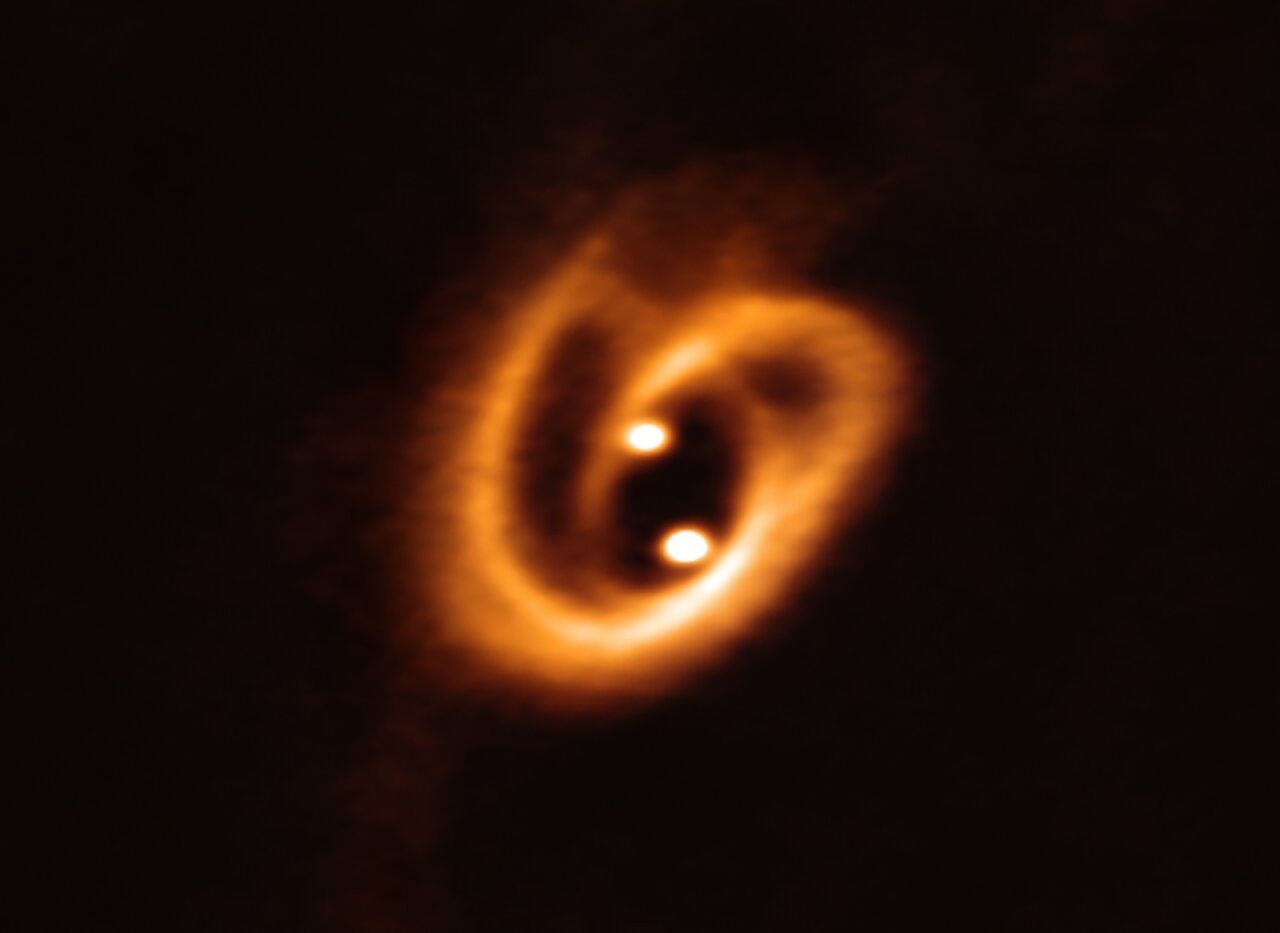 The Atacama Large Millimeter/submillimeter Array captured this unprecedented image of two circumstellar disks, in which baby stars are growing, feeding off material from their surrounding birth disk. 
