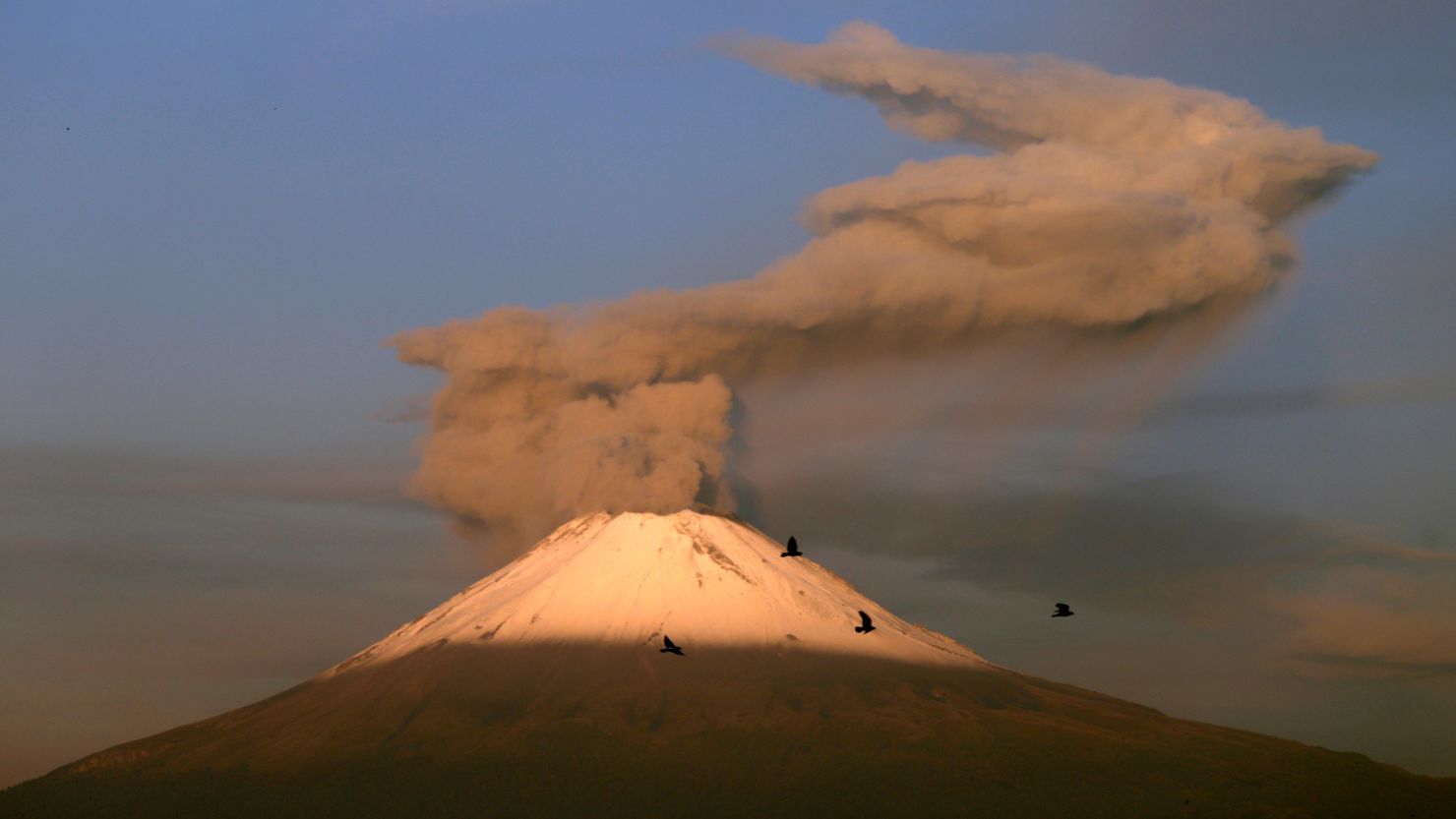 A  view of Popocatépetl's eruptions from the city of Puebla, Mexico, on October 2, 2019.