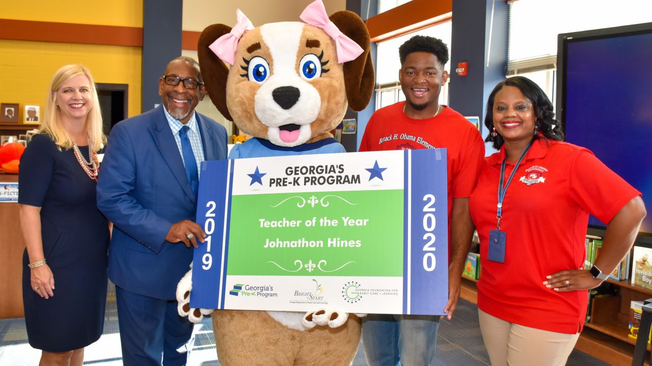 Jonathon Hines (second from the right) is the first black man to win Georgia's pre-K teacher of the year award. 