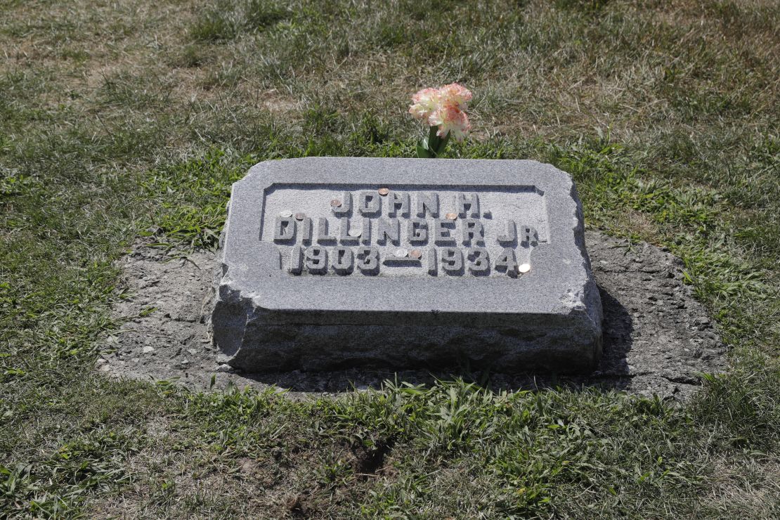 The headstone of John Dillinger is seen at Crown Hill Cemetery, Thursday, Aug. 1, 2019, in Indianapolis.