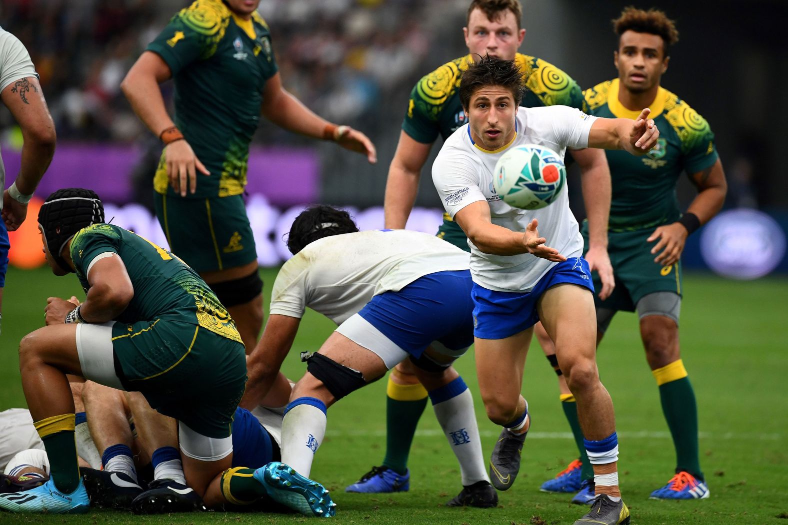 Uruguay's scrum-half Santiago Arata passes the ball during the clash against the Wallabies.