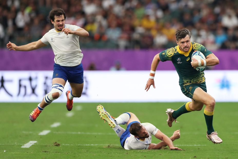 Adam Ashley-Cooper of Australia makes a break during his side's 45-10 win over Uruguay in Pool D at the Oita Stadium.