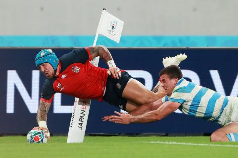 Jack Nowell of England scores his side's fifth try as 14-man Argentina wilted under pressure.