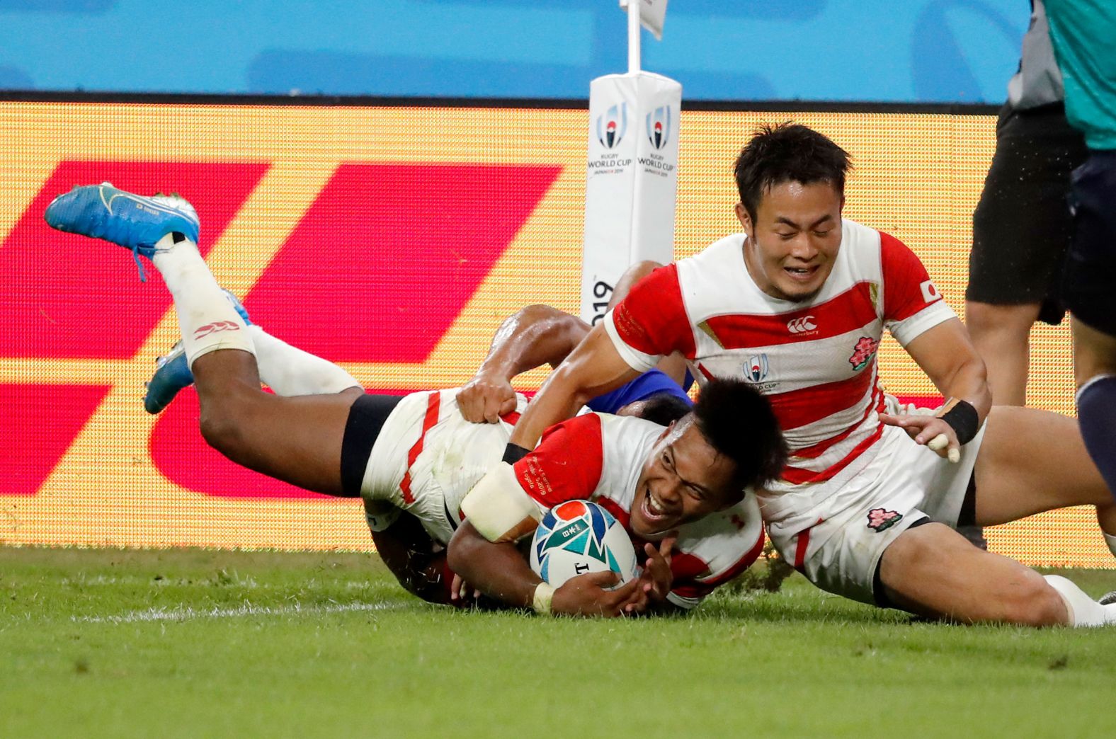 Japan's Kotaro Matsushima reacts after scoring his side's vital fourth bonus-point try in the 39-18 win over Samoa in Pool A.