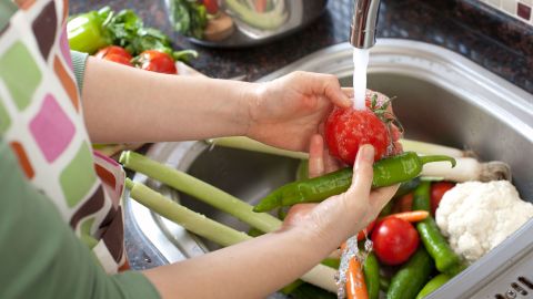 It's not a good idea to wash your veggies in the sink. "Many people defrost raw meat products in sinks or rinse raw chicken and don't do more than run water to clean it," Gerba said. "You really shouldn't be cutting up your salad in the kitchen sink."