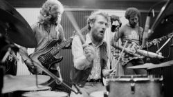 English rock group the Baker Gurvitz Army in a studio, August 1974. Left to right: Paul Gurvitz, Ginger Baker and Adrian Gurvitz. (Photo by Michael Putland/Getty Images)