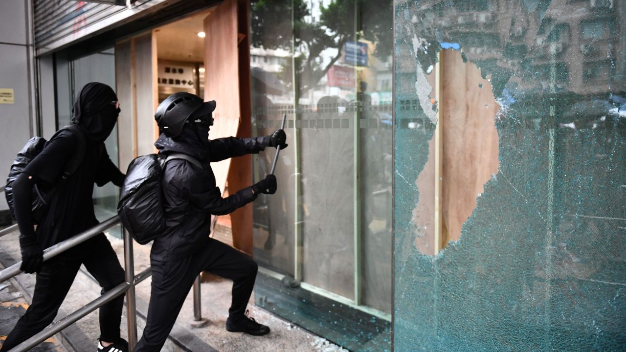Protesters vandalize the Cheung Sha Wan local government offices in Hong Kong on Sunday.