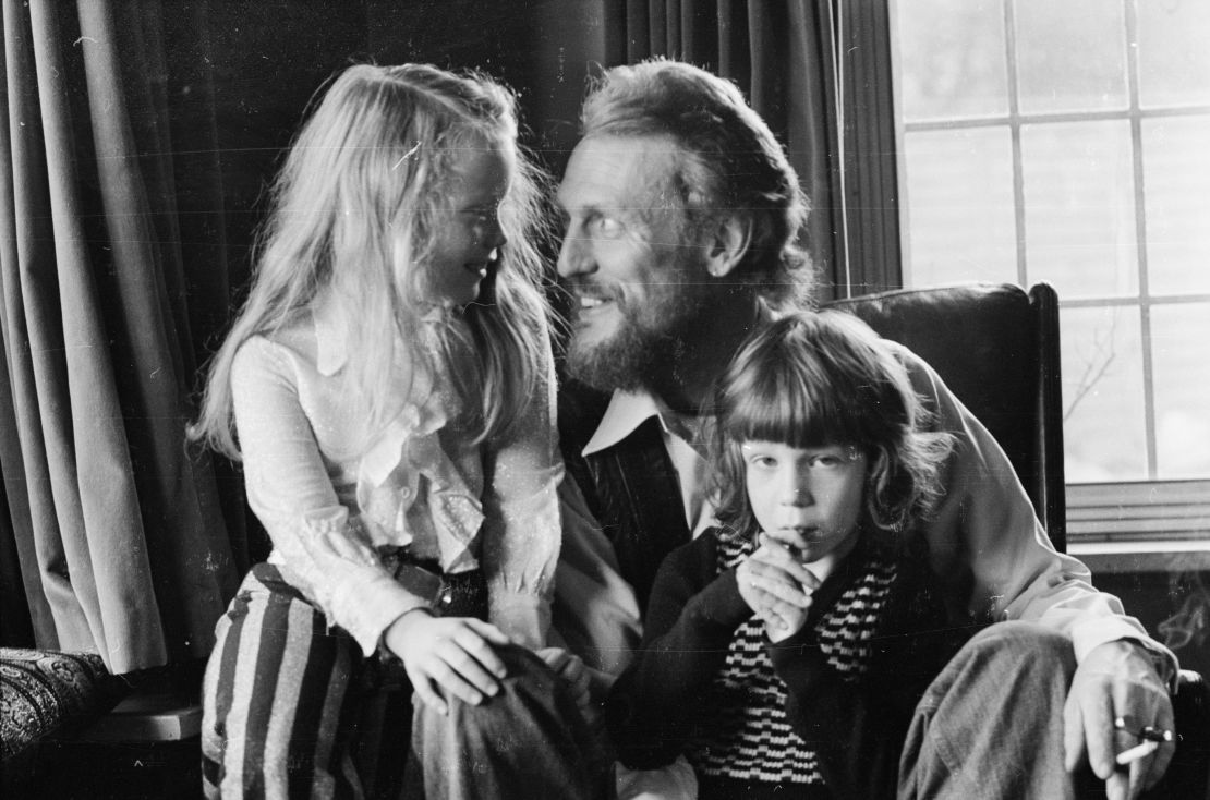 Ginger Baker pictured at home with his children in December 1974.