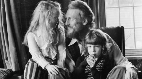 Ginger Baker pictured at home with his children in December 1974.