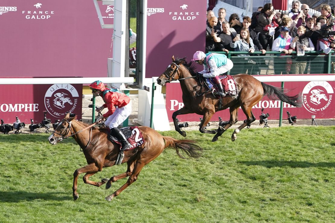 Waldgeist (left) dashes Enable's hopes of a record third straight Arc title.