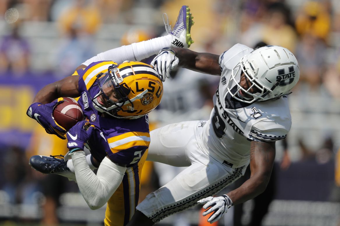 LSU wide receiver Justin Jefferson pulls in a pass during a college football game against Utah State on Saturday, October 5.