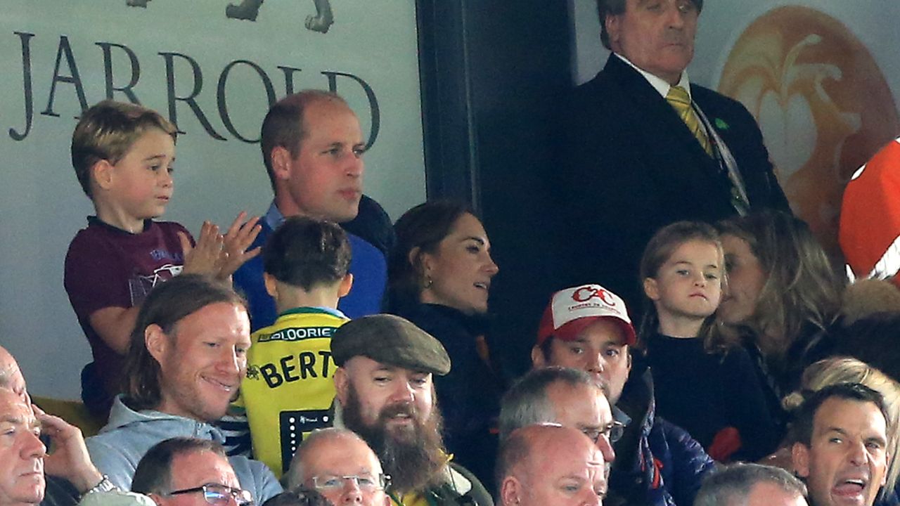 NORWICH, ENGLAND - OCTOBER 05: Prince George of Cambridge,  Prince William, Duke of Cambridge and Catherine, Duchess of Cambridge and Princess Charlotte of Cambridge are seen in the stands during the Premier League match between Norwich City and Aston Villa at Carrow Road on October 05, 2019 in Norwich, United Kingdom. (Photo by Stephen Pond/Getty Images)