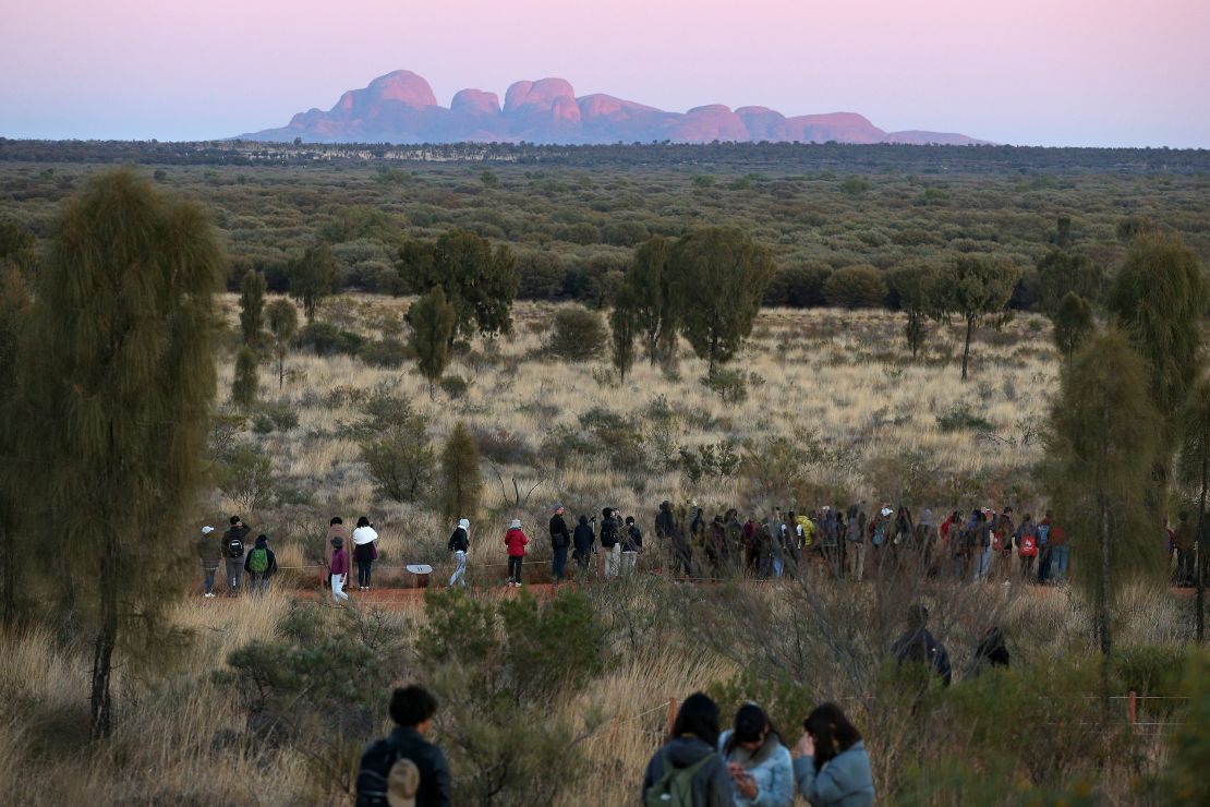 Visitors flock to Uluru before an impending ban on climbing the monolith comes into effect.