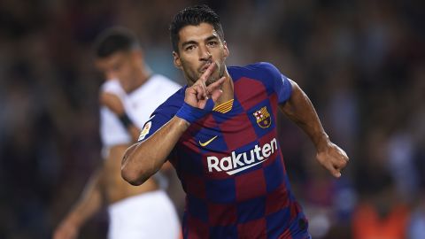 Luis Suarez is filmed at home sharing a barbecue with his teammates in the new documentary.