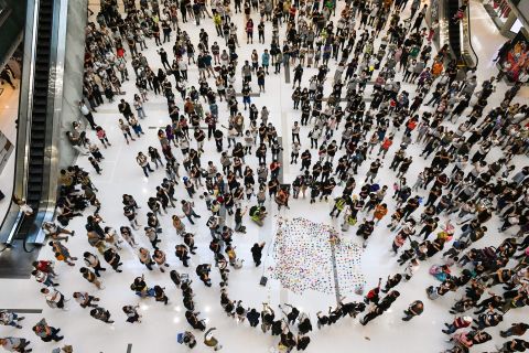 Pro-democracy protesters gather in a shopping mall on October 7.