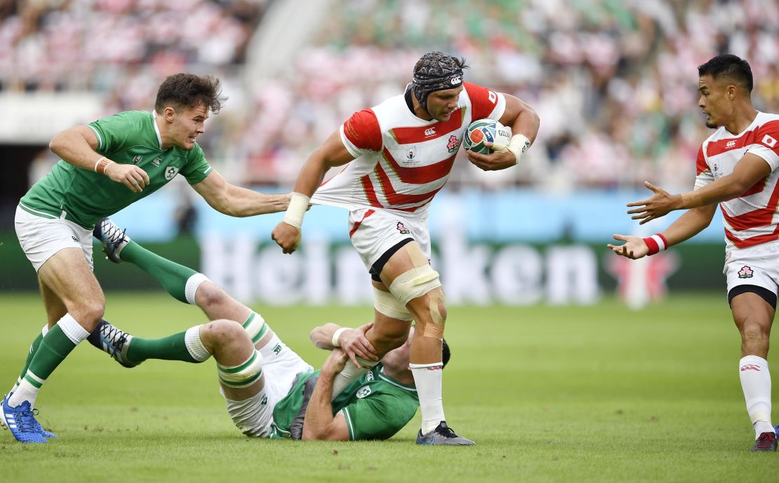 Japan's Pieter Labuschagne on the charge against Ireland.