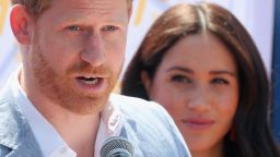 JOHANNESBURG, SOUTH AFRICA - OCTOBER 02:  Meghan, Duchess of Sussex looks on as Prince Harry, Duke of Sussex speaks during a visit a township to learn about Youth Employment Services on October 02, 2019 in Johannesburg, South Africa..  (Photo by Chris Jackson/Getty Images)