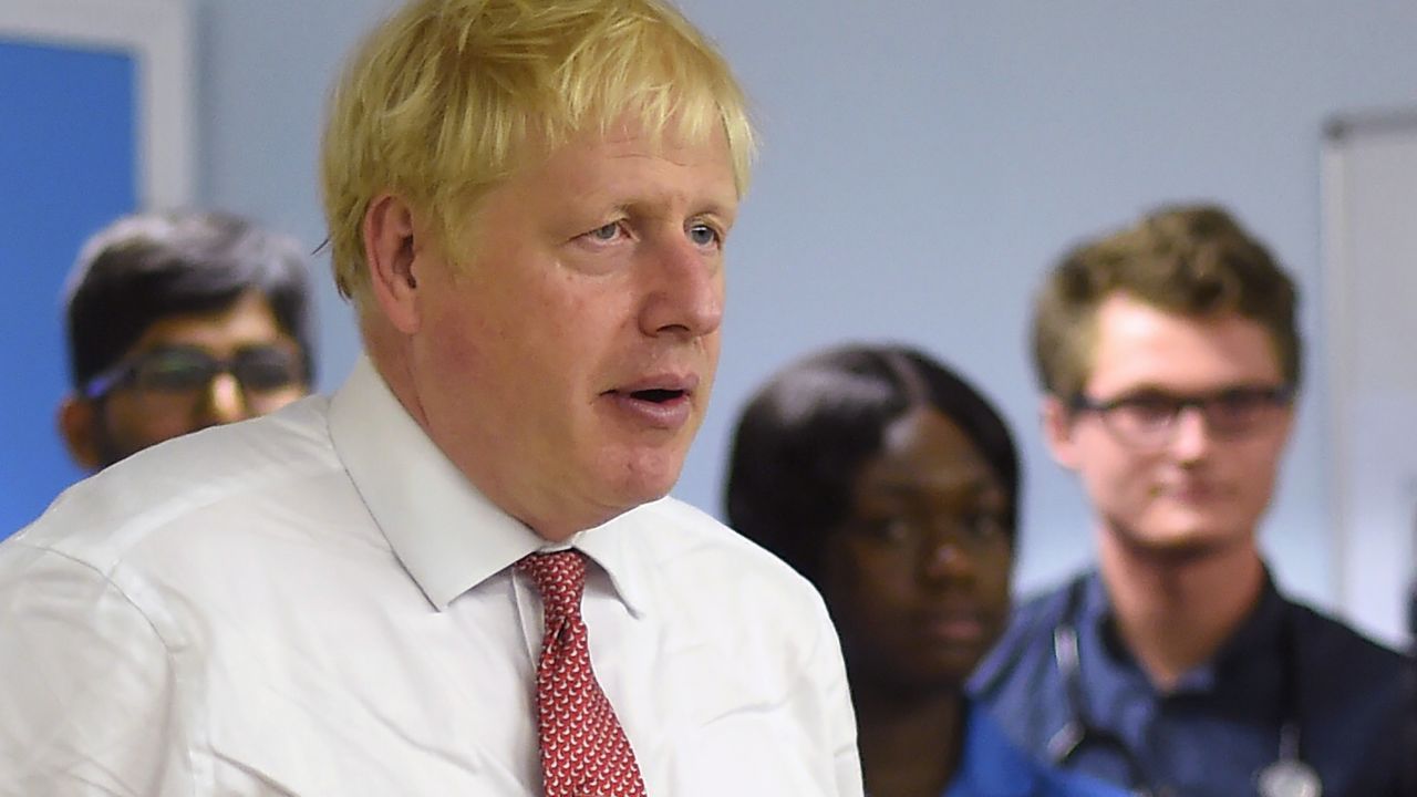 Britain's Prime Minister Boris Johnson speaks to nurses and hospital workers during his visit to Watford General hospital in Watford, north of London on on October 7, 2019. - British Prime Minister Boris Johnson has warned French President Emmanuel Macron he will not delay Brexit beyond October 31, underlining that his latest proposals are a last chance to reach a deal, a Downing Street spokesman said on Sunday. (Photo by Peter Summers / POOL / AFP) (Photo by PETER SUMMERS/POOL/AFP via Getty Images)