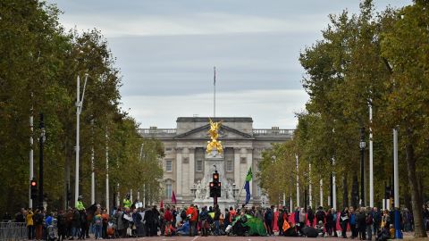 Climate change activists block The Mall as they demonstrate near Buckingham Palace.