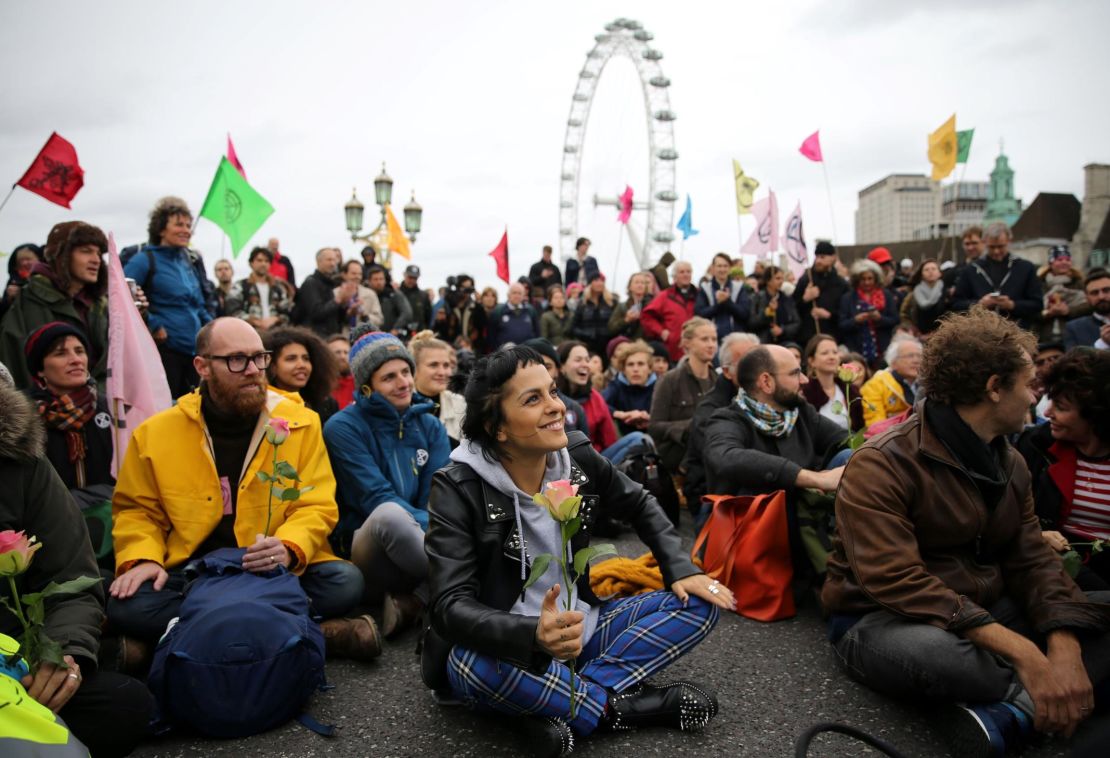 Activists gather on Westminster Bridge during the protests.