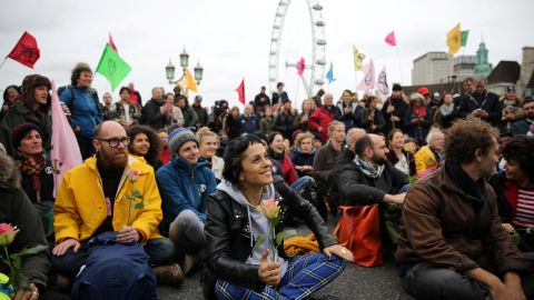 Activists gather on Westminster Bridge during the protests.