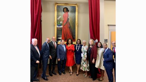 Oprah Winfrey stands in front of a portrait unveiled in her honor at Morehouse College in Atlanta, Georgia, on Monday, October 7, 2019.