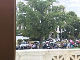 People wait in line to get into the Supreme Court for oral arguments on LGBT workplace rights, on Tuesday, October 8.