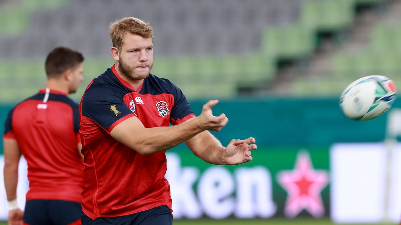 Joe Launchbury passes the ball during the England training session in Kobe, Japan.