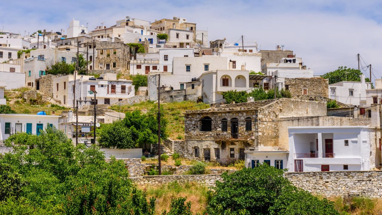 <strong>Apiranthos, Naxos: </strong>This Cycladic village built on the slopes of Mount Fanari, is made up of tall stone houses, marble street slabs and impressive inland views.