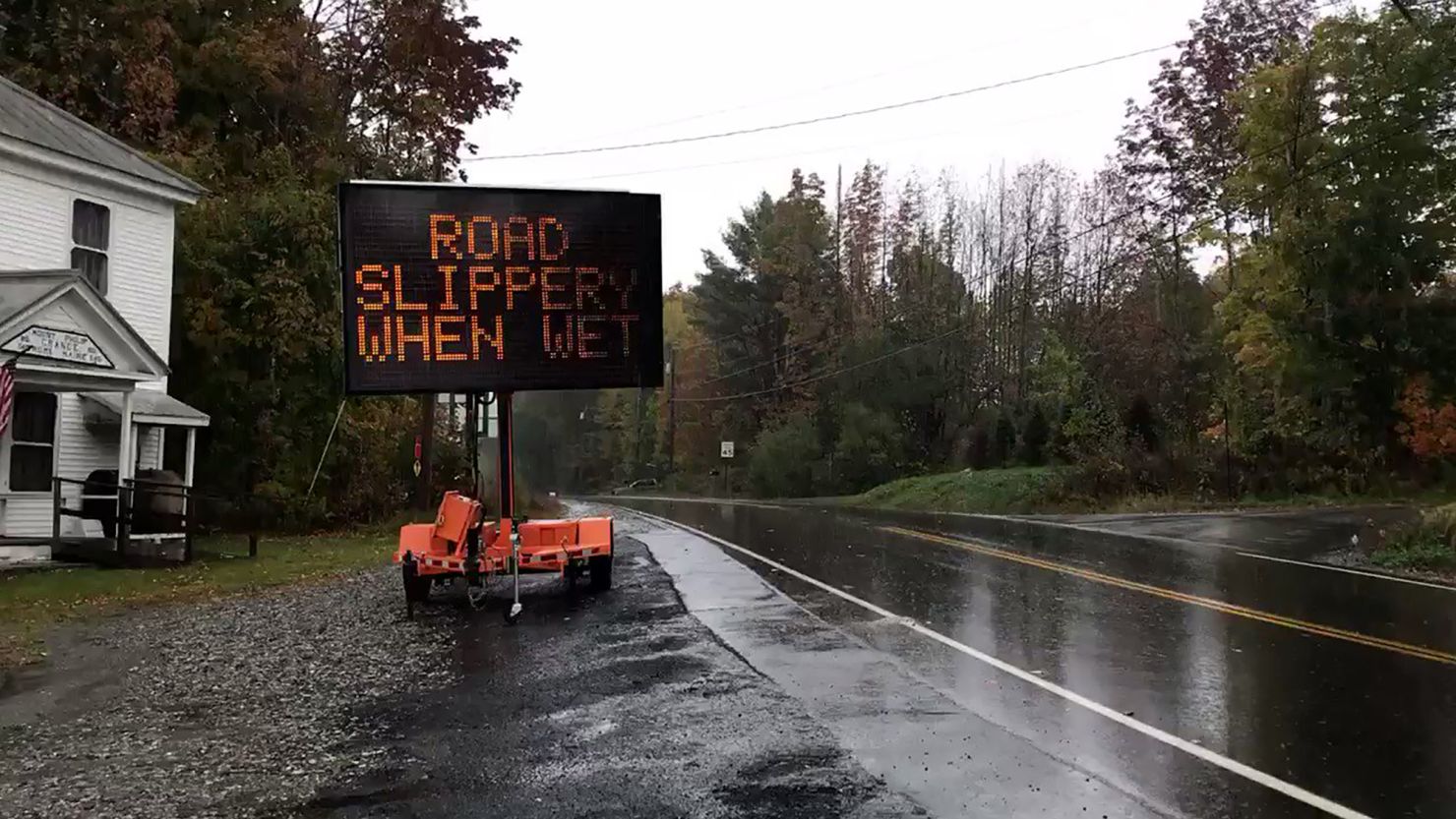 Residents described a section of road in Maine, seen here after rain, as unusually slippery after a pavement sealant was applied. 