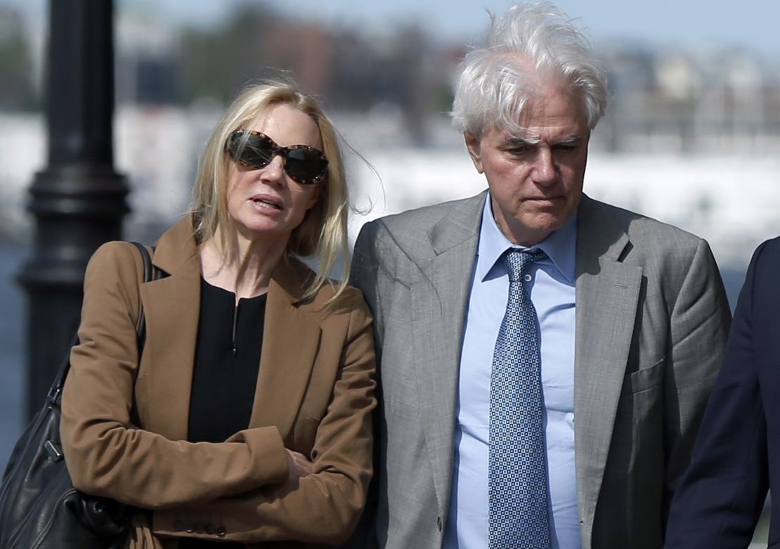 Marcia and Gregory Abbott leave federal court after they pleaded guilty to conspiracy charges on May 22, 2019.