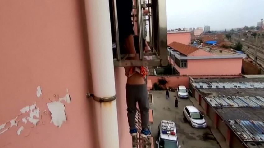 boy balcony rescue china