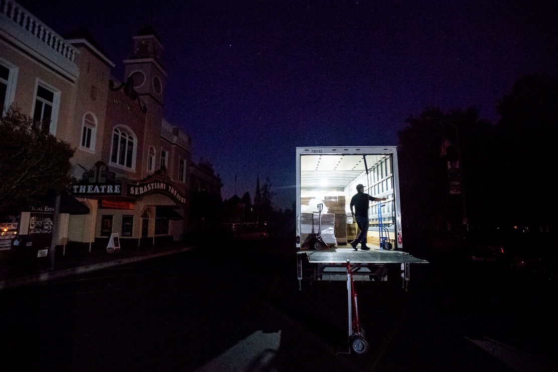 Armando Espinoza delivers paper products to a cafe in Sonoma, California, during a power outage on Wednesday.