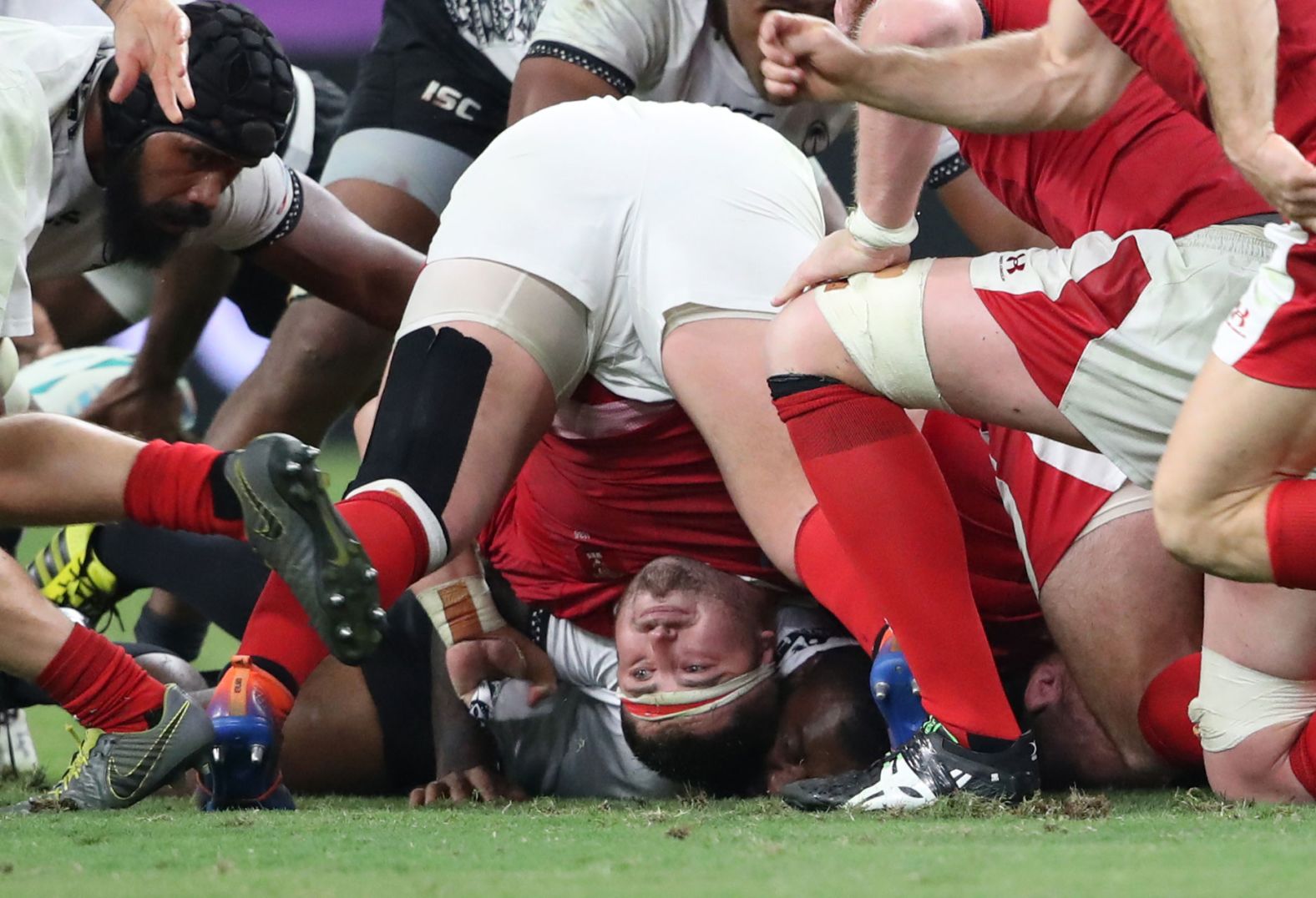 Wales fell behind by 10 points early in the first half, but a hat-trick from Josh Adams helped it recover. 