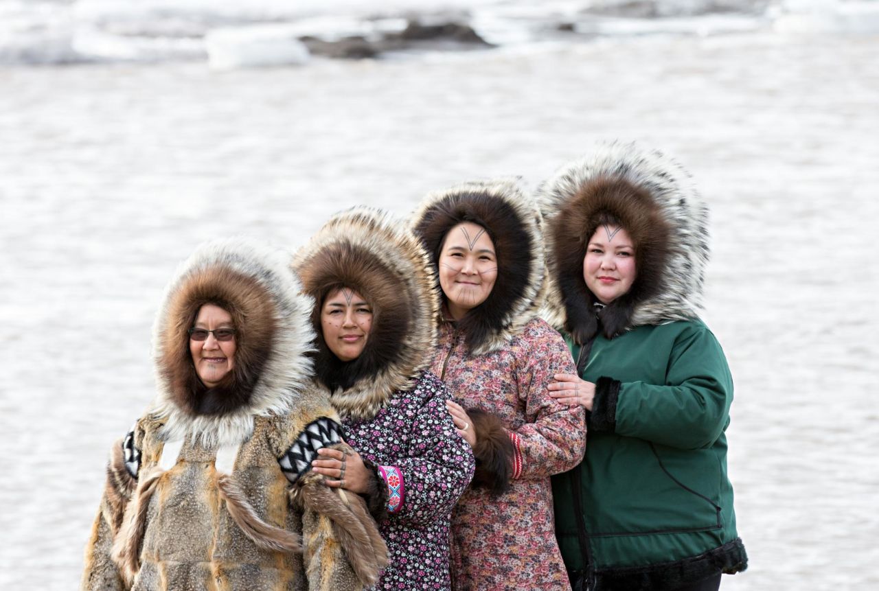 <strong>Marking revitalization: </strong>Hovak Johnston (second from right) poses with women who received their markings as part of Johnston's<strong> </strong>Inuit Tattoo Revitalization Project that travels to remote northern Canada communities.