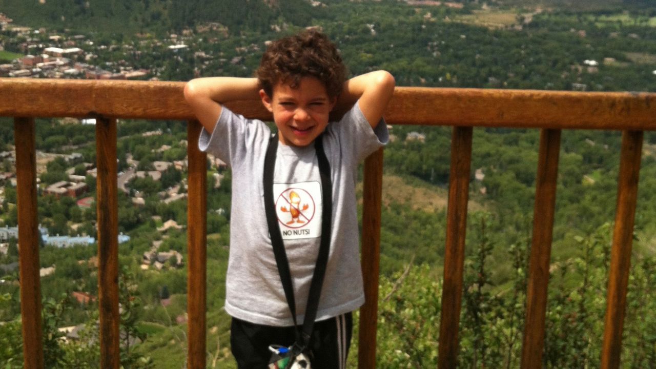 Josh Mandelbaum on vacation in Colorado. He was bullied by other children in the airport while flying home.