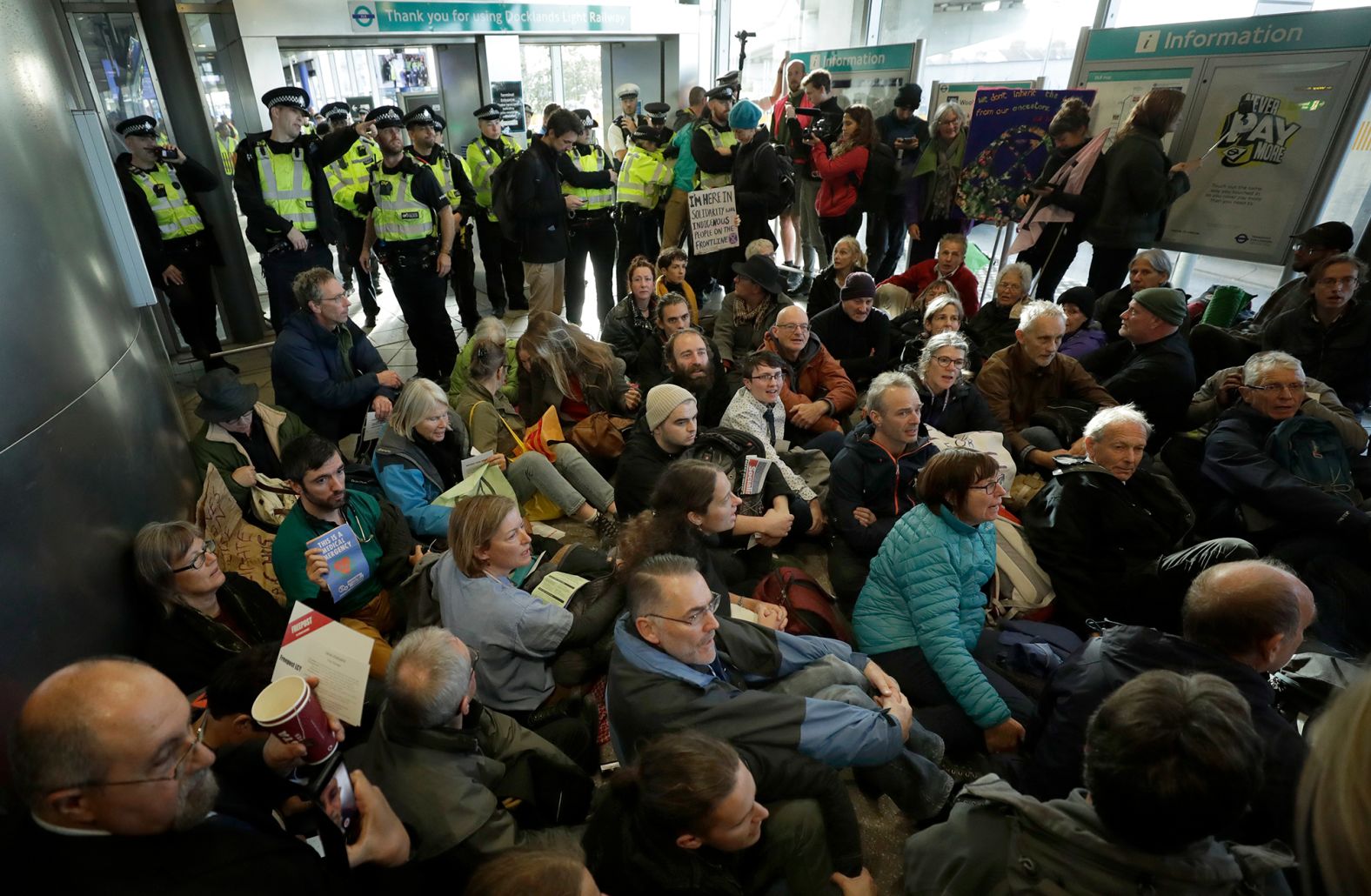 Extinction Rebellion demonstrators block an entrance to the City Airport in London on October 10.