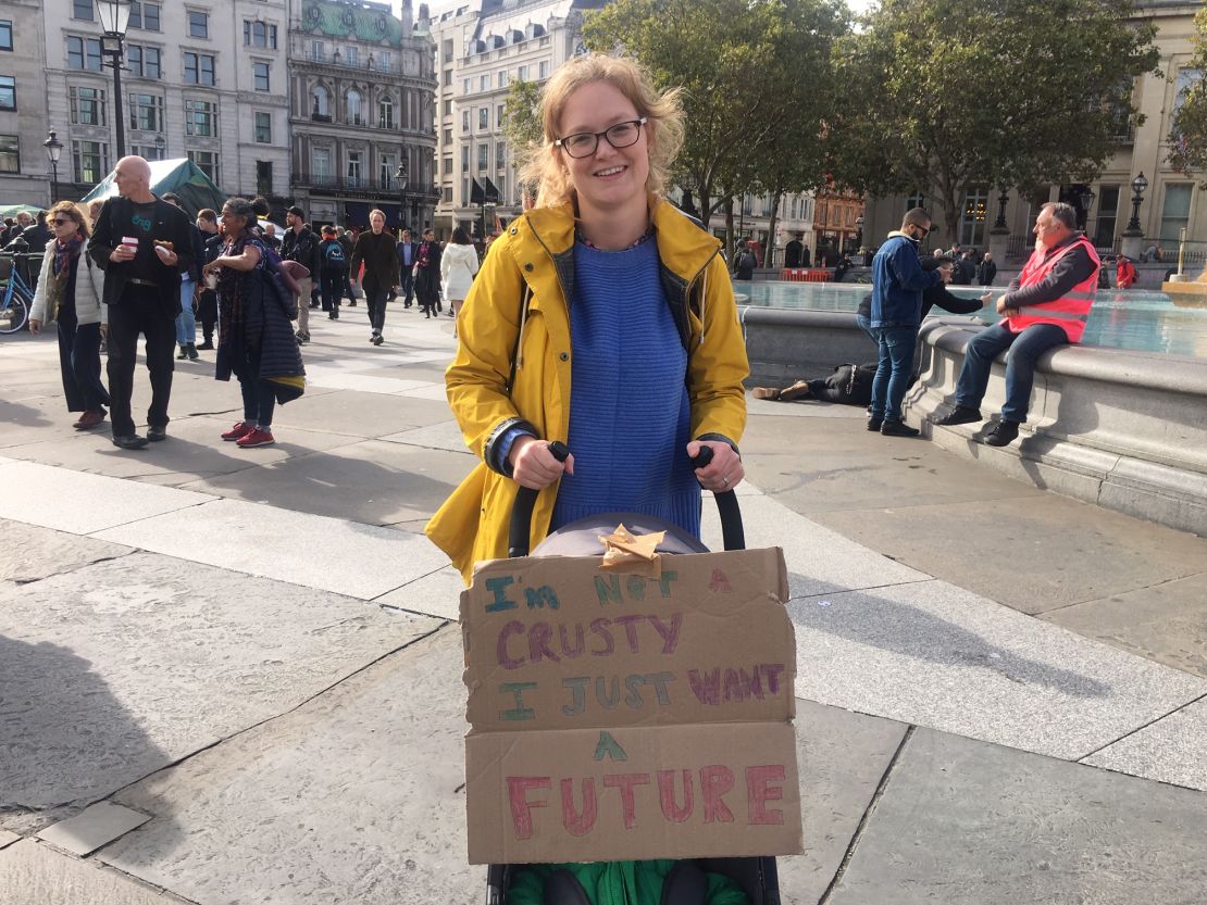 A mother from south London takes part in Extinction Rebellion's others' march.