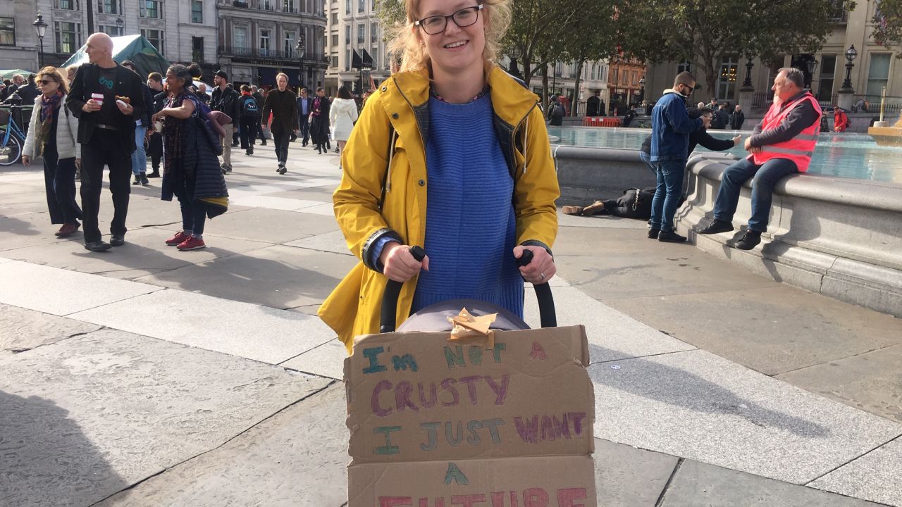 A mother from south London takes part in Extinction Rebellion's others' march.