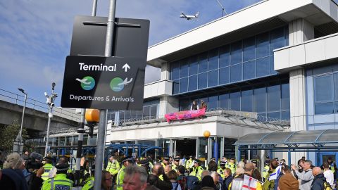Demonstrators protest at London City Airport.