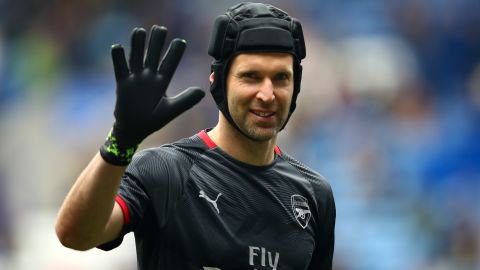 Petr Cech wore a rugby-style scrum-cap after a serious head injury.