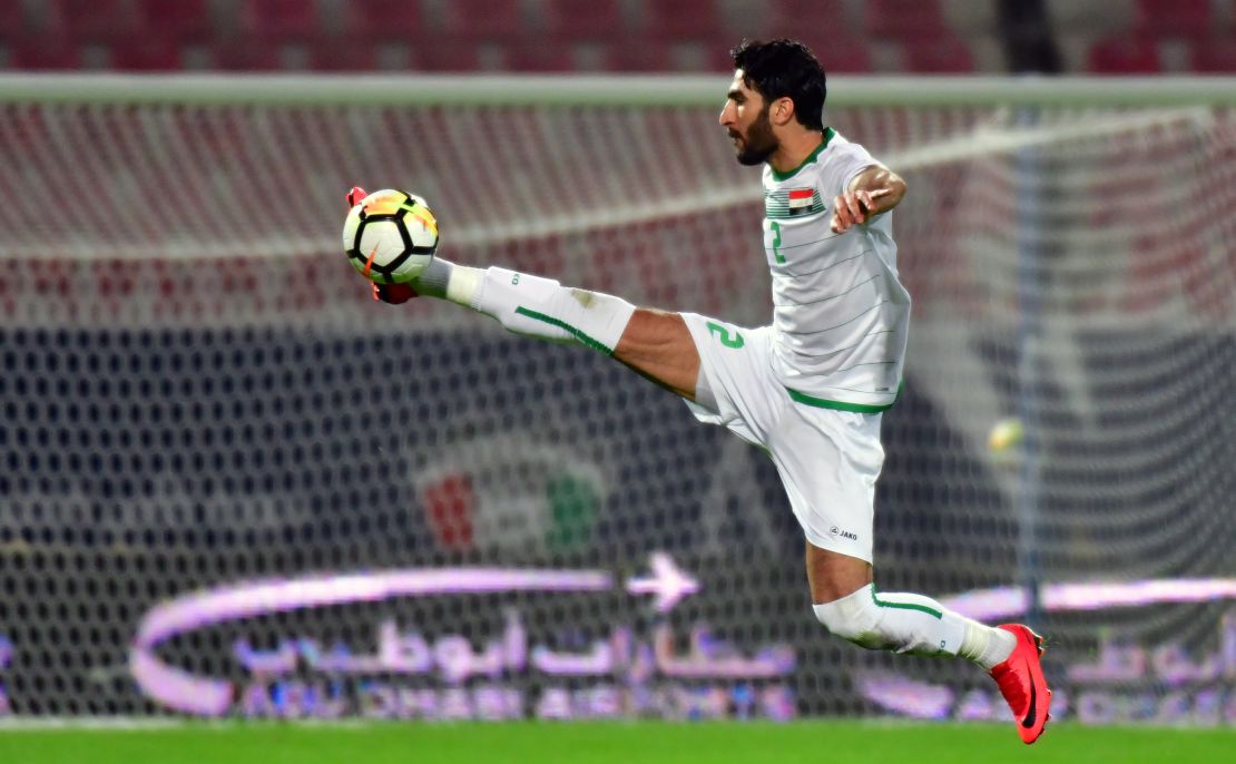 Ahmad Ibrahim stops the ball in mid-air during his 2017 Gulf Cup of Nations football match between Iraq and Bahrain in Kuwait City on December 23, 2017. 