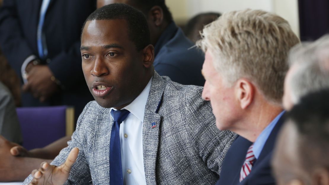 Richmond Mayor Levar Stoney, left, speaks at a gun violence prevention discussion this year.
