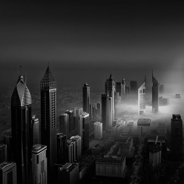 The series focuses on Dubai's architecture and particularly its towering skyscrapers. <br /><br />The Emirates Towers are seen here lit up and shrouded in mist. 