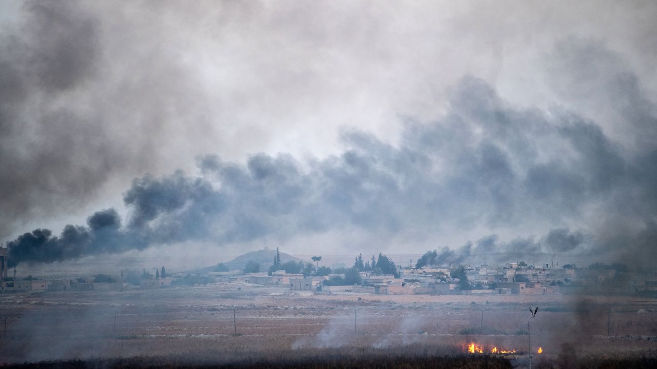 Smoke rises from Tal Abyad, Syria, on October 10.
