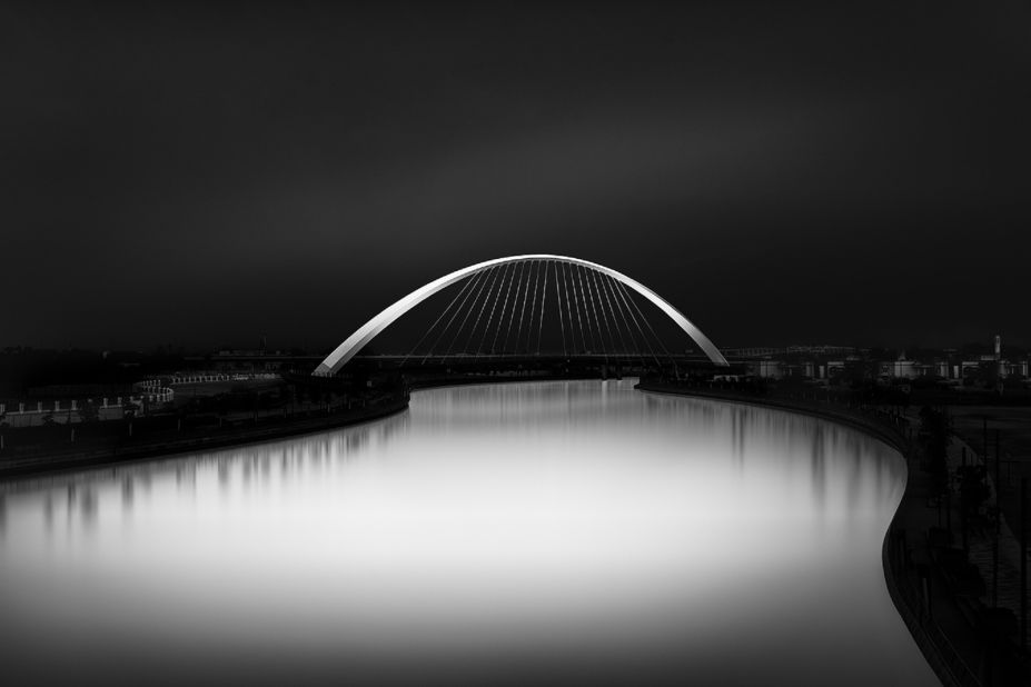 A ghostly vision of the Tolerance Bridge, empty of traffic and pedestrians.