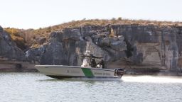 A dual-engine United States Border Patrol boat surveys the Rio Grande River and Texas' border with Mexico on New Year's Day, 2010. Due to its remote location, the area west of Del Rio is patrolled regularly for drug smugging and human trafficking from Mexico. (Photo by Robert Daemmrich Photography Inc/Corbis via Getty Images)